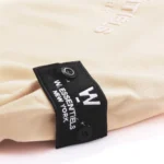 W Essentiels Hoodie Ecume Monopack Triple Tan - Image 4